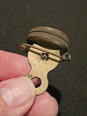 Marble’s Gladstone Michigan brass compass pin back