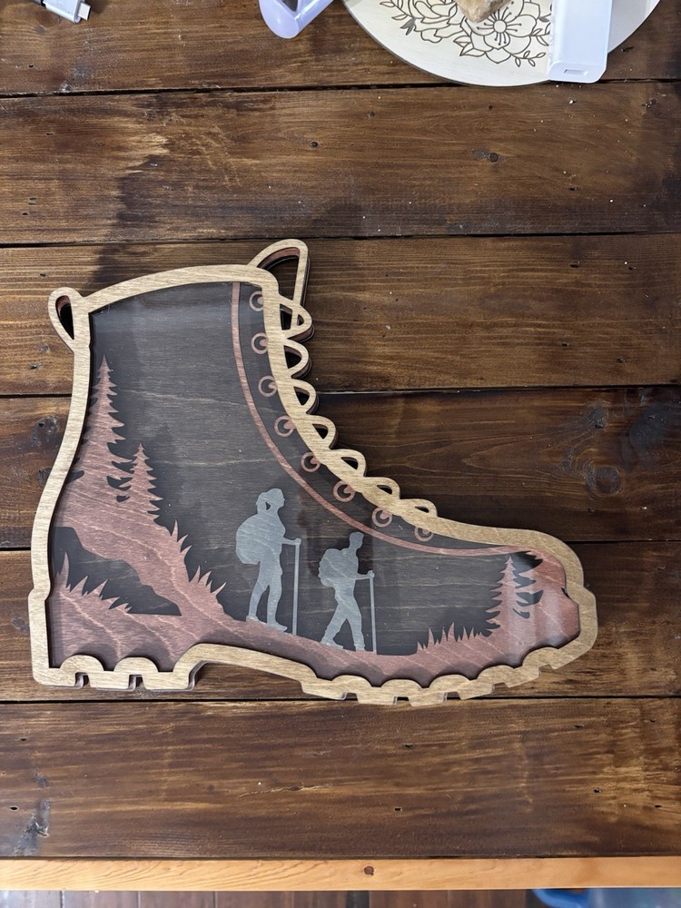 Hiking Boot With Tokens To List All Your Hikes