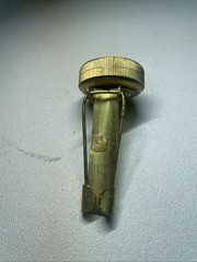 Vintage brass pin on compass