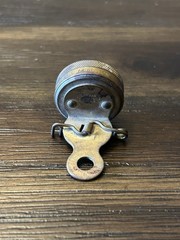Marble’s Gladstone Michigan brass compass pin back