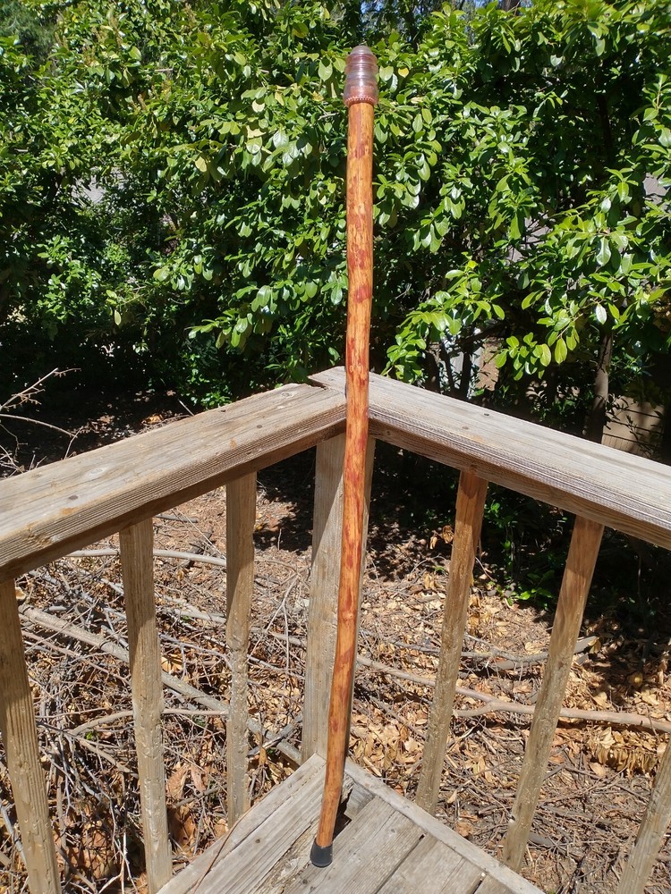 A handcrafted / Handmade hiking stick