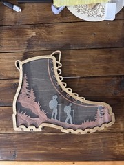 Hiking Boot With Tokens To List All Your Hikes