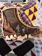 Hiking Boot With Tokens To List All Your Hikes