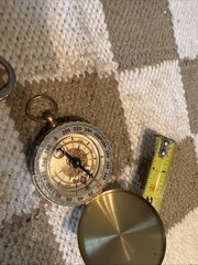 Vin.Pocket Style Compass Liquid Filled 2” W/cover And A Fleur De Lis Key Chain
