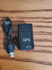 Unbranded GPS Unit, Charge Cord & Pamplet