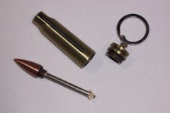 FLINT AND STEEL BULLET CASE FIRE STARTER SURVIVAL TOOL KEYCHAIN W/ TINDER INSIDE