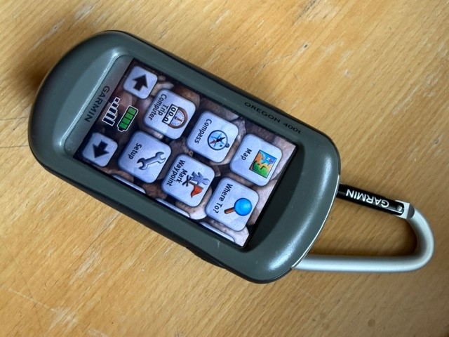 Garmin Oregon 400t GPS for hiking . Battery box needs cleaning. Works fine.