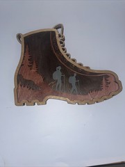 Hiking Boot With Tokens To List All Your Hikes