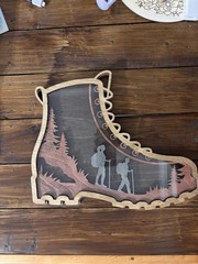 Hiking Boot With Tokens To List All Your Hikes