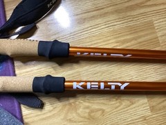 Kelty Metallic Orange Walking Stick Anti Shock System W/ Wrist Strap & Tip Cover