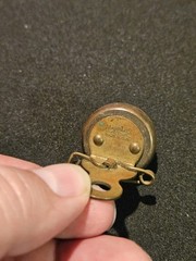 Marble’s Gladstone Michigan brass compass pin back