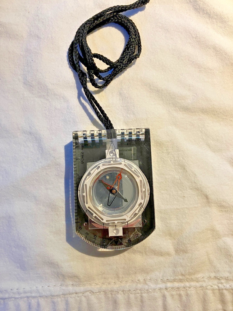 Brunton mirrored sighting compass with declination scale and pouch, made in USA