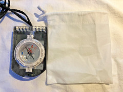 Brunton mirrored sighting compass with declination scale and pouch, made in USA