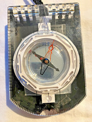 Brunton mirrored sighting compass with declination scale and pouch, made in USA