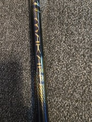 This is a Leki trekking pole featuring a black grip and an adjustable shaft.
