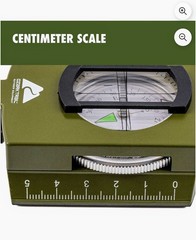 Trail Military Style Green Compass with Durable Metal Body for Nighttime Use.