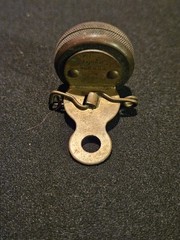 Marble’s Gladstone Michigan brass compass pin back