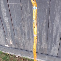Handmade Wooden Walking Stick with Carved Face and Painted Accents for Hiking