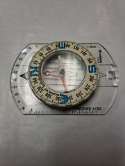 Vintage BRUNTON USA Compass 1991 Clear Blue Letters White No Batteries Needed