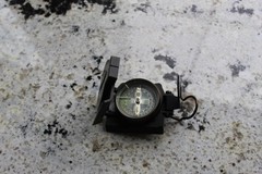Vintage military compass folds up to compact travel size