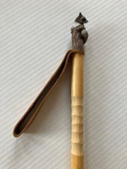 Hardwood walking and treking pole for nature hikes, racoon figurine on top