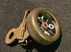 Marble’s Gladstone Michigan brass compass pin back