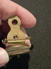 Marble’s Gladstone Michigan brass compass pin back