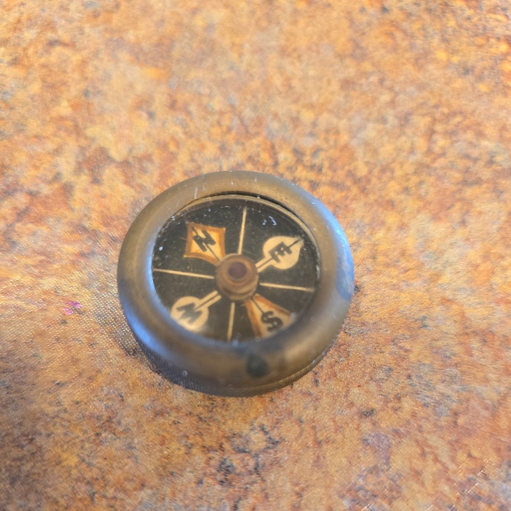 Marble’s Gladstone Michigan brass compass pin back