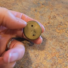Marble’s Gladstone Michigan brass compass pin back