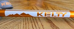 Kelty Metallic Orange Walking Stick Anti Shock System W/ Wrist Strap & Tip Cover