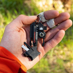 Outsider – 4-In-1 Survival Multi-Tool | Compass, Thermometer, Whistle, and Fire