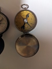 Set of 2 Vintage liquid filled pocket compasses. 1 German 1 Japan both working