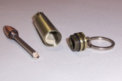FLINT AND STEEL BULLET CASE FIRE STARTER SURVIVAL TOOL KEYCHAIN W/ TINDER INSIDE