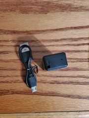 Unbranded GPS Unit, Charge Cord & Pamplet
